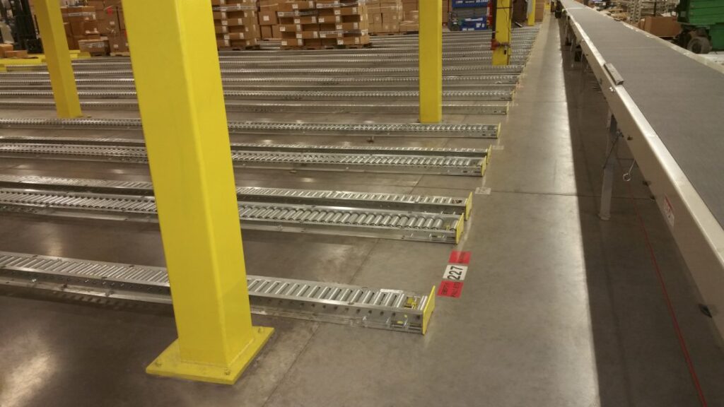 Floor-Mounted Pallet Conveyor - Warehouse Optimizers, Inc.